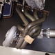 Illustration for article titled Your Car Could Use A Boost From Formula One So Buy This Gigantic BMW F1 Turbo Kit